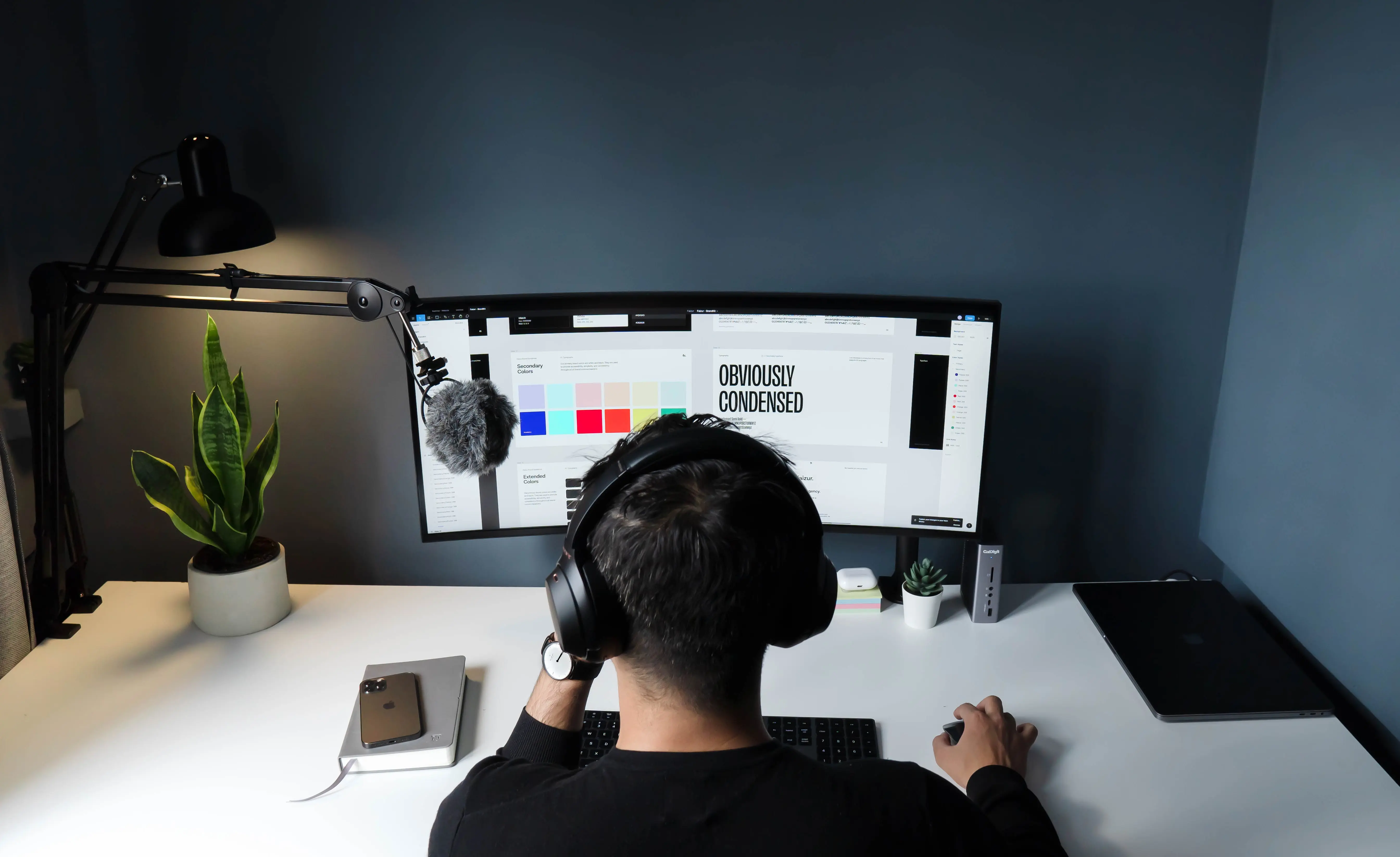 A photo of a person sitting front of the computer